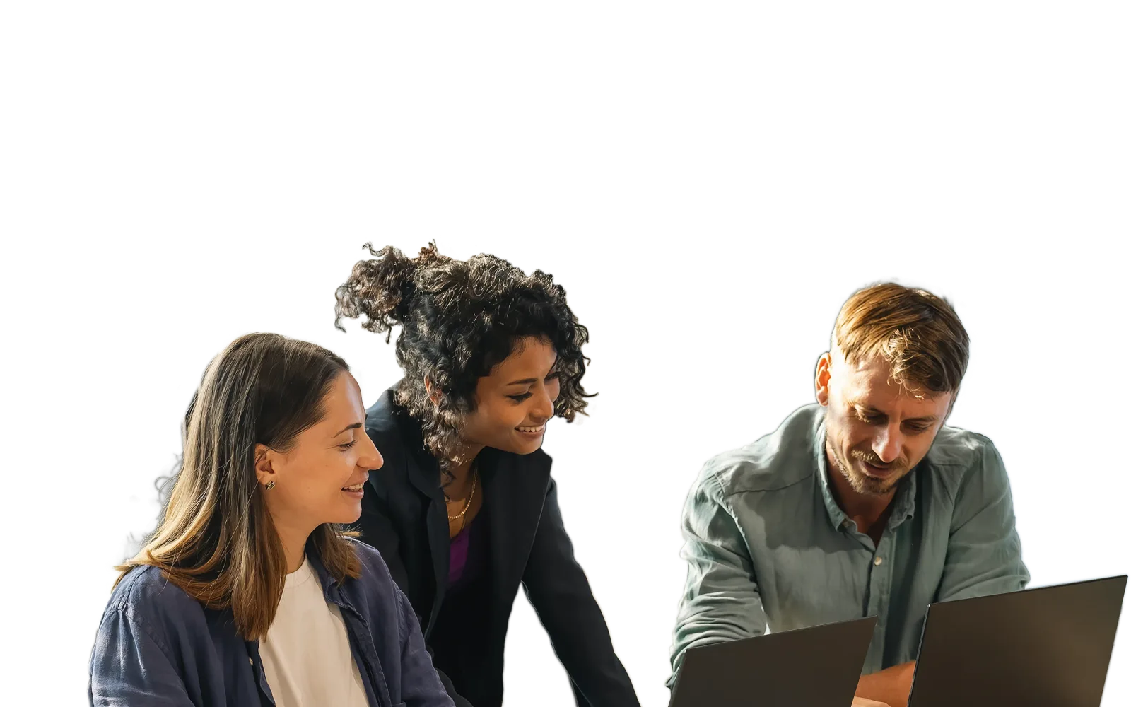 Colleagues looking at a laptop together.