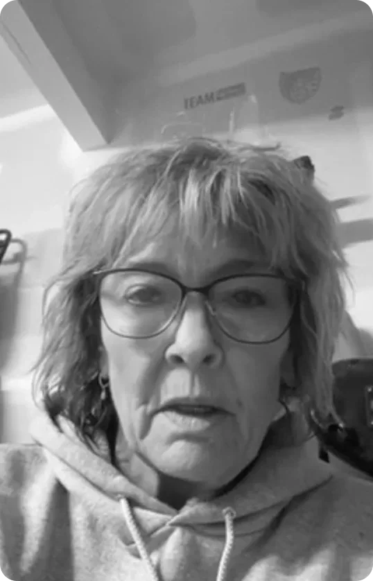 J.D. speaking into a microphone